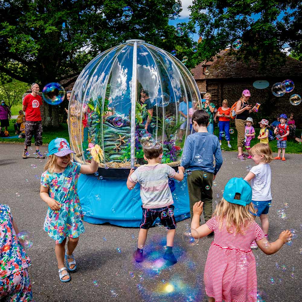Sea Sphere entertaining children at a festival